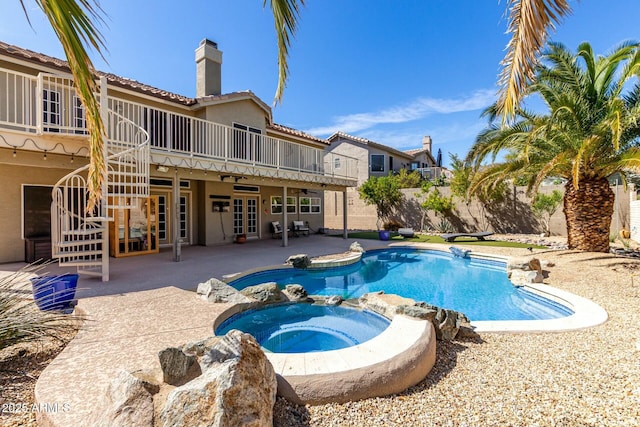 16047 S 14th Dr, Phoenix, AZ 85045 - view of pool featuring a pool with connected hot tub, a patio area, stairway, french doors, and a deck