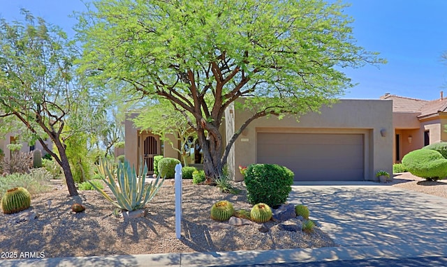 32710 N 71st St, Scottsdale, AZ 85266 - southwest-style home featuring an attached garage, driveway, and stucco siding
