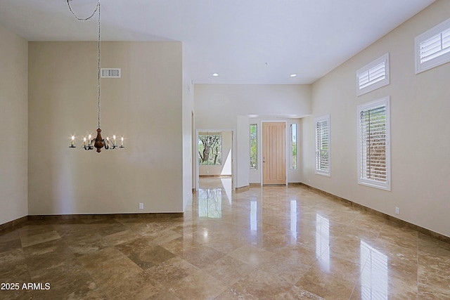 32710 N 71st St, Scottsdale, AZ 85266 - foyer with a chandelier, a towering ceiling, and recessed lighting