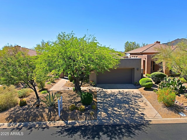 32710 N 71st St, Scottsdale, AZ 85266 - view of front of home featuring an attached garage, stucco siding, driveway, and a tile roof