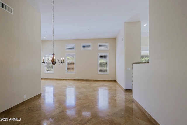 32710 N 71st St, Scottsdale, AZ 85266 - empty room with a chandelier, marble tiled floors, and recessed lighting