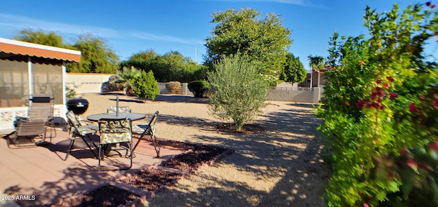 view of yard featuring a fenced backyard and a patio