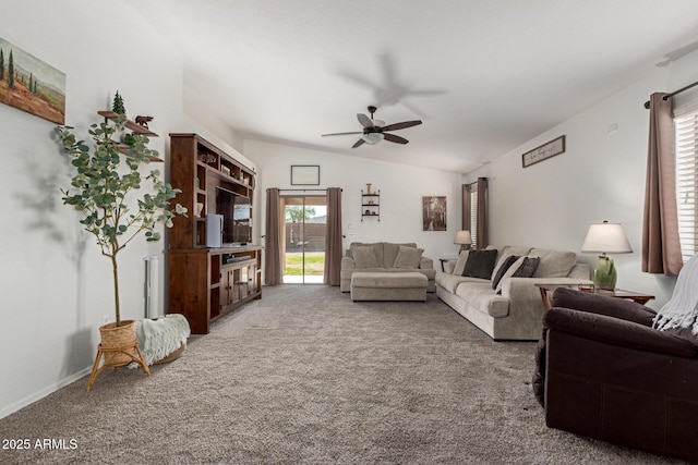 carpeted living room with lofted ceiling and ceiling fan