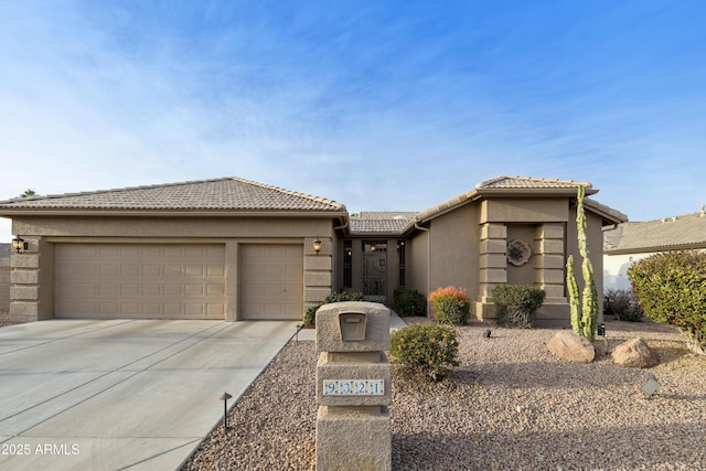 view of front of home with a garage