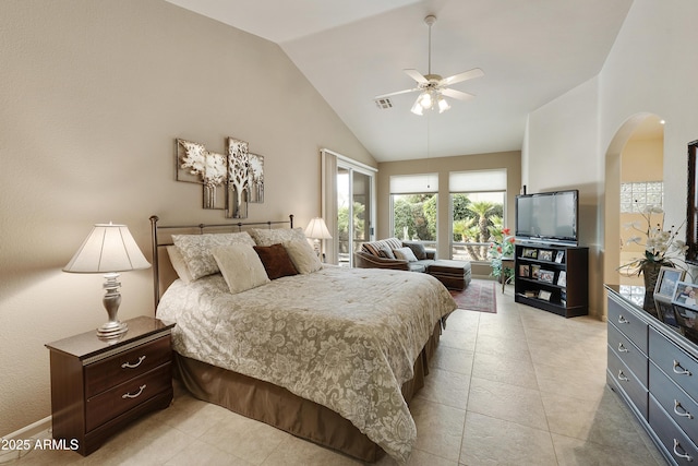 bedroom with ceiling fan and high vaulted ceiling