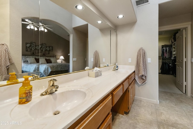 bathroom with vanity and ceiling fan