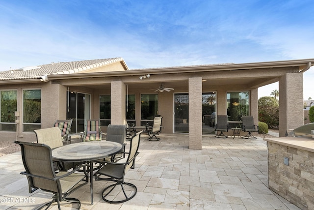 view of patio / terrace with ceiling fan