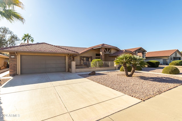 view of front of property featuring a garage