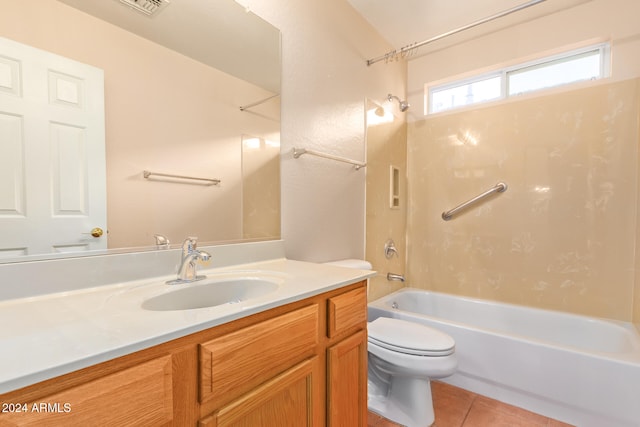 full bathroom featuring vanity, tile patterned flooring, toilet, and shower / bath combination