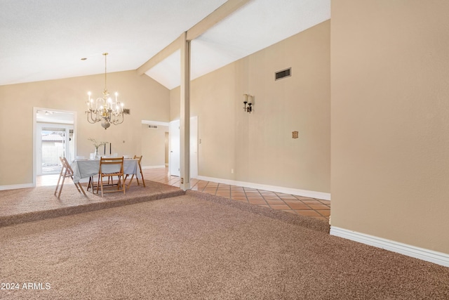 unfurnished dining area with tile patterned flooring, high vaulted ceiling, and a chandelier