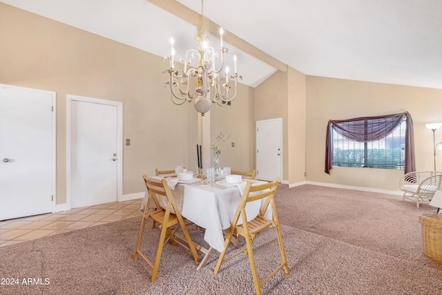 dining space with tile patterned flooring, a chandelier, and high vaulted ceiling