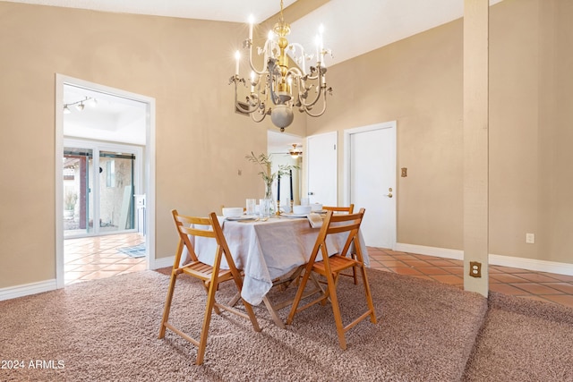 tiled dining space featuring a chandelier