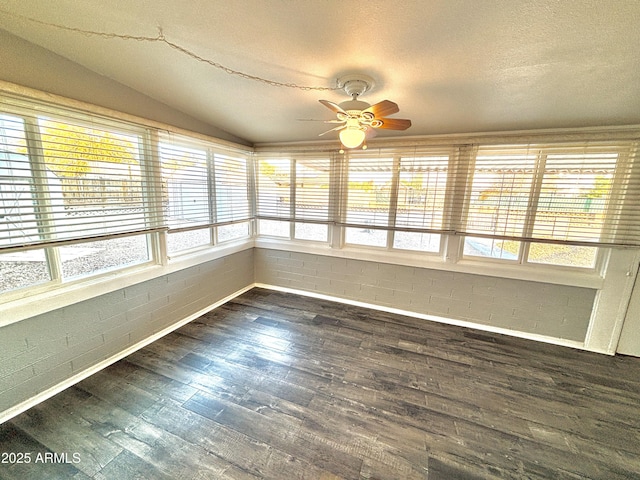 unfurnished sunroom featuring lofted ceiling and ceiling fan