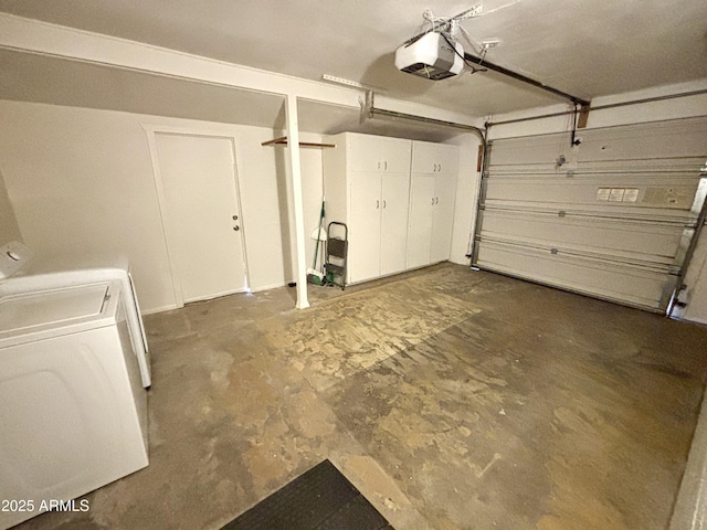 garage featuring a garage door opener and washing machine and dryer