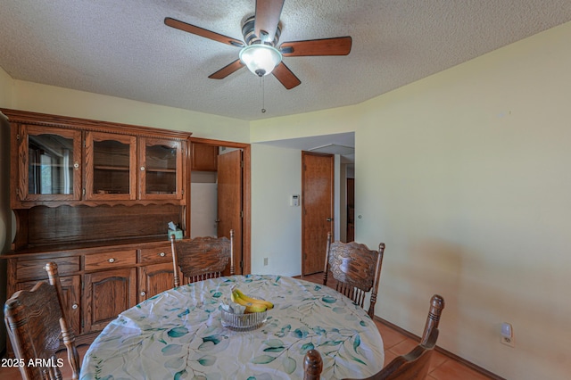 18622 E Via De Arboles, Queen Creek, AZ 85142 - dining area featuring a textured ceiling and ceiling fan