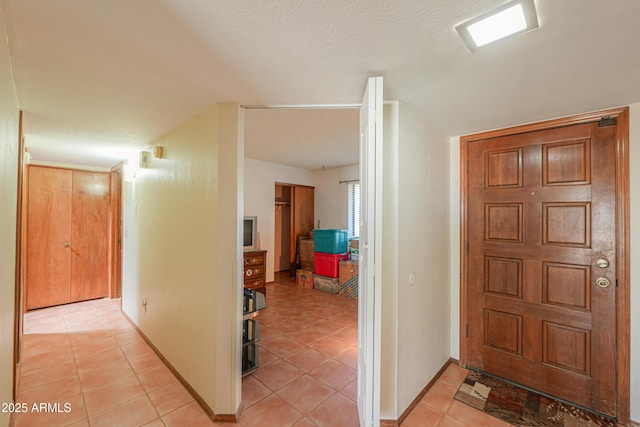18622 E Via De Arboles, Queen Creek, AZ 85142 - hall featuring light tile patterned floors and baseboards