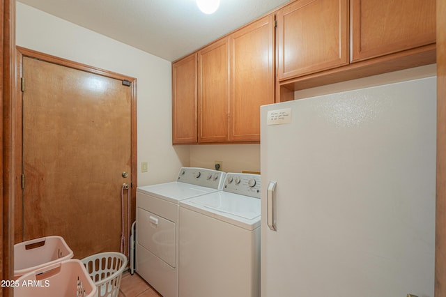 18622 E Via De Arboles, Queen Creek, AZ 85142 - clothes washing area with light tile patterned floors, cabinet space, and washer and clothes dryer