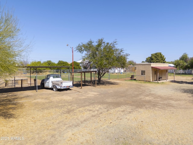 18622 E Via De Arboles, Queen Creek, AZ 85142 - view of car parking featuring a carport and fence