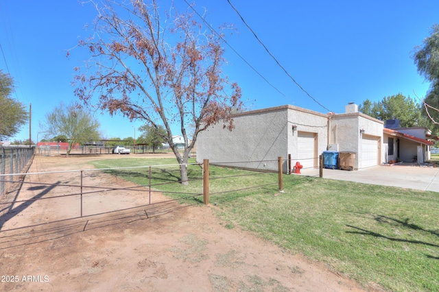 18622 E Via De Arboles, Queen Creek, AZ 85142 - view of property exterior with stucco siding, a lawn, fence, concrete driveway, and an attached garage
