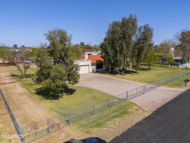 18622 E Via De Arboles, Queen Creek, AZ 85142 - obstructed view of property featuring a garage, driveway, a front lawn, and fence
