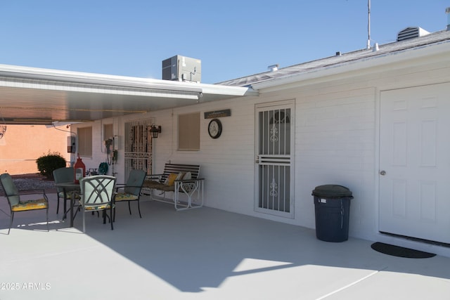 view of patio / terrace featuring outdoor dining space and central AC