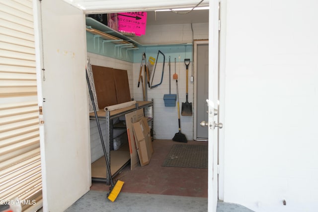 interior space featuring concrete block wall
