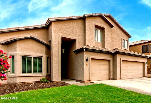 view of front of property with a garage