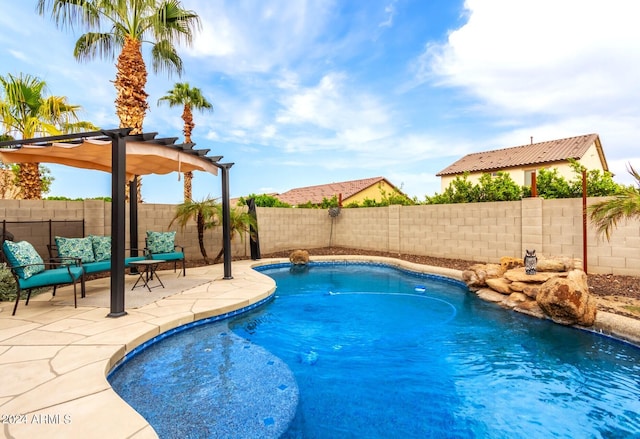 view of swimming pool featuring a patio and a pergola