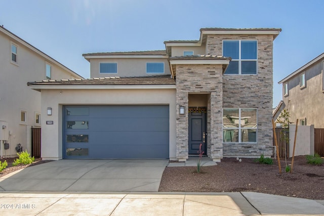 view of front of home featuring a garage