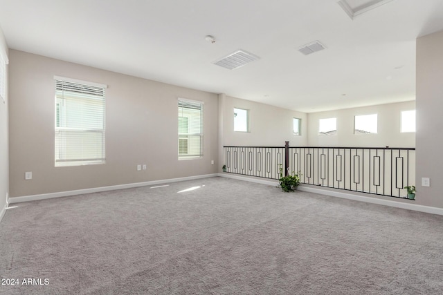 spare room with carpet floors