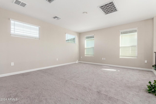 unfurnished room featuring carpet floors