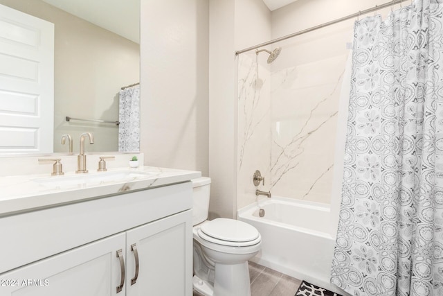 full bathroom with vanity, toilet, and shower / tub combo