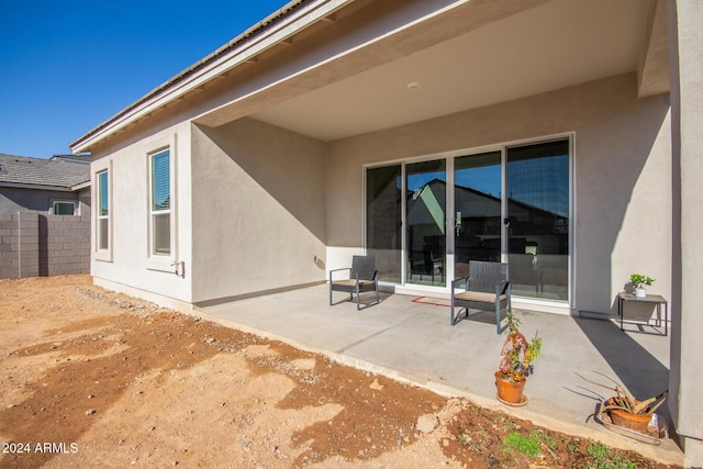 rear view of house featuring a patio