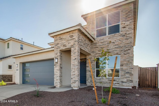 view of front of property featuring a garage