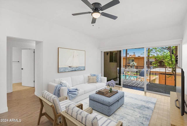 6125 E Indian School Rd Unit 240, Scottsdale, AZ 85251 - living room featuring light wood finished floors and a ceiling fan