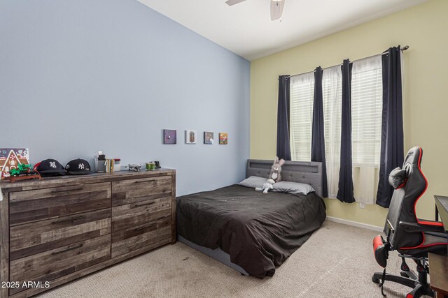 bedroom featuring carpet flooring and a ceiling fan