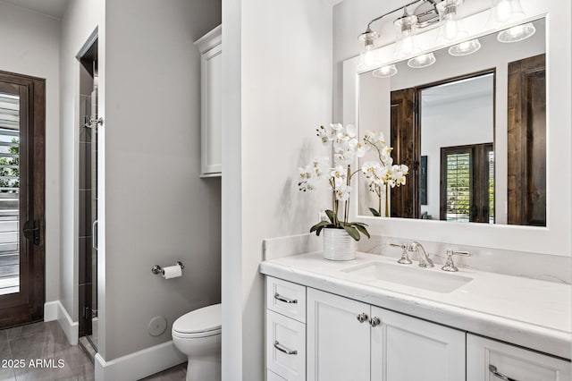 13750 E Yucca St, Scottsdale, AZ 85259 - full bath featuring vanity, plenty of natural light, toilet, and baseboards
