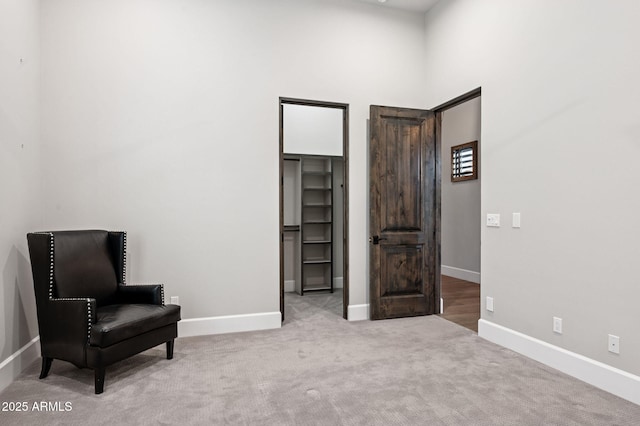 13750 E Yucca St, Scottsdale, AZ 85259 - living area featuring baseboards, carpet, and a towering ceiling