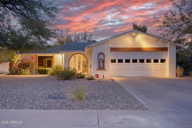 ranch-style house with a garage