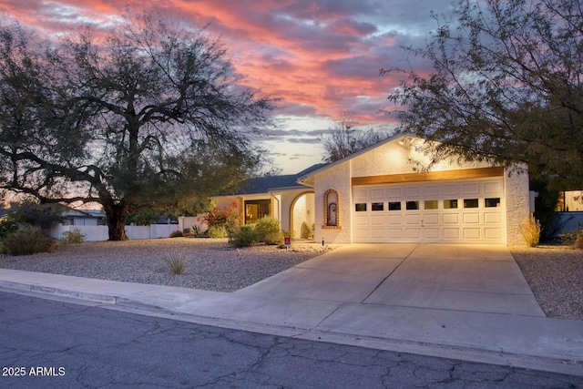 view of front of property with a garage