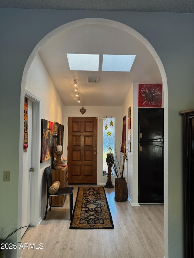 entrance foyer featuring light hardwood / wood-style flooring