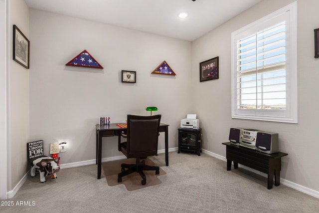 office space with light colored carpet and a wealth of natural light