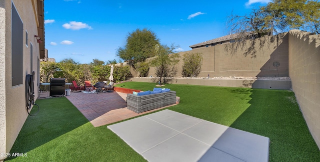 view of yard with a fenced backyard and a patio