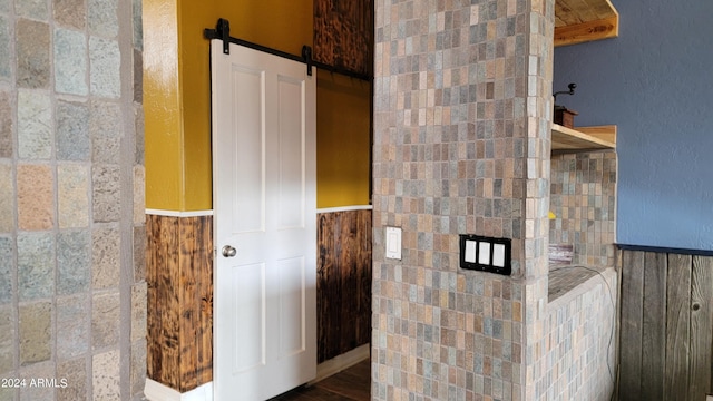 bathroom with hardwood / wood-style flooring