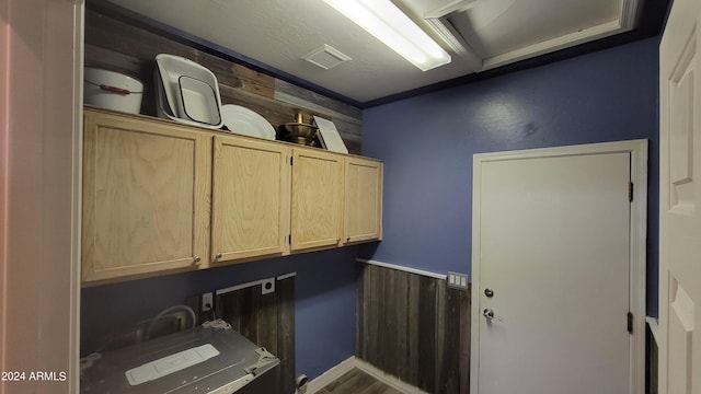 washroom featuring cabinets