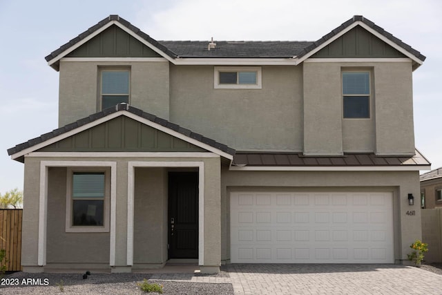 view of front of home with a garage