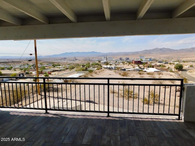 wooden terrace with a residential view and a mountain view