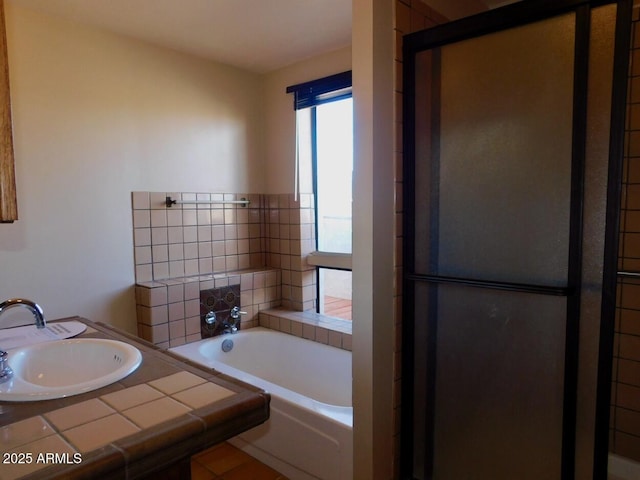 bathroom with a sink and a bath