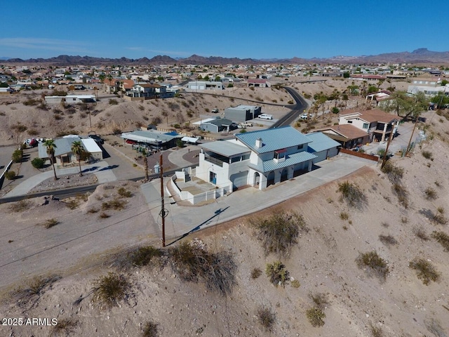 birds eye view of property with a residential view and a mountain view