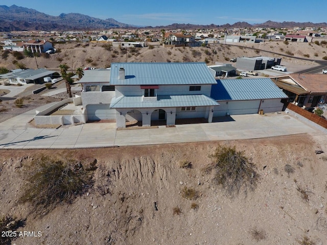 birds eye view of property featuring a residential view and a mountain view